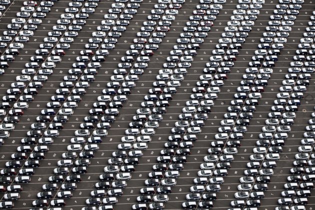 hundreds-of-imported-vehicles-are-parked-in-a-storage-lot-after-being-unloaded-from-freight-ships-in-elizabeth-nj-the-us-trade-deficit-widened-more-than-expected-in-september-as-foreign-oil-prices-rose-to-the-highest-level-in-nearly-a-year