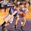 Fayetteville senior forward Adam Nobel, right, is fouled by Colton Primm defends during the Bulldogs...
