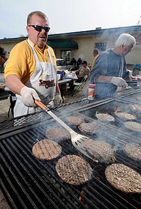 Tim Gray, left, president of ...