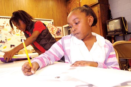 brittany-eskridge-left-and-kaellan-lawrence-do-homework-at-our-club-in-jacksonville-they-are-among-25-students-the-club-serves