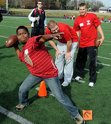 Jerwin Billy, 13, throws a ...