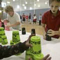Maiya Evans (from left), Daniel O’Dell and Xalon Graddy compete with classmates at Pine Forest Eleme...