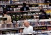 Shoppers browse the video games and DVDs on display at a Best Buy store in Lakewood, Colo., in this file photo.