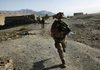 French Foreign Legion soldiers run for positions during a rocket-propelled grenade attack by insurgents during “Operation Avalon” in the Tagab Valley, Afghanistan, on Sunday.