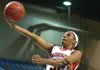 Arkansas' Charity Ford lays the basketball up during women's basketball action Sunday.