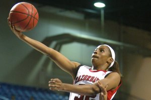Arkansas' Charity Ford lays the basketball up during women's basketball action Sunday.