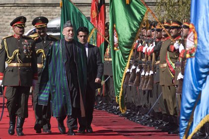 afghan-president-hamid-karzai-third-left-inspects-guard-of-honor-during-his-inauguration-as-president-of-afghanistan-at-the-presidential-palace-in-kabul-afghanistan-thursday