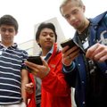 Springdale Har-Ber High School students Chandler Grace, Fahad Sabal and Matthew Tetrick plot their p...
