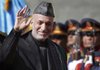 Hamid Karzai arrives Thursday at the Afghan presidential palace in Kabul for his second-term inauguration. 