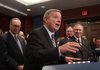 Senate Majority Whip Dick Durbin of Illinois joins Majority Leader Harry Reid (right) and other Democrats on Thursday at a news conference on their health-care overhaul plan.