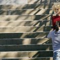 Missouri State University senior Kathryn Knipple moves a mannequin while photographing it for a medi...