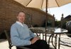 Tom Galyon enjoys his favorite space, his enlcosed garden at his home in Rogers.