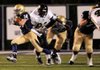 Shiloh Christian running back Wilson Huett 
sprints upfield against DeQueen during the Class 4A state playoffs Friday in Champions Stadium in Springdale.