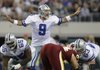 Dallas quarterback Tony Romo (9) overcame early struggles to lead the Cowboys to a 7-6 victory over the Washington Redskins on Sunday at Cowboys Stadium Arlington, Texas. The victory kept the Cowboys in first place in the NFC East. 