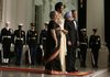 The Obamas welcome Indian Prime Minister Manmohan Singh and his wife, Gursharan Kaur, for a state dinner Tuesday at the White House.