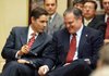 Julius Genachowski (left), chairman of the Federal Communications Commission, and Sen. Mark Pryor, D-Ark., discuss the need to extend broadband to rural areas during an event Tuesday at the Clinton School of Public Service in Little Rock.