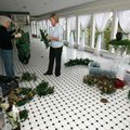 Judy Marquess (left) and Judy Geigle sort through Christmas decorations Tuesday afternoon at the Pee...