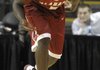 Alabama’s Tony Mitchell (above) staggers down the court after receiving a gash above his eye during the second half of the Crimson Tide’s 79-76 victory over Baylor on Wednesday at the Old Spice Classic in Lake Buena Vista, Fla.