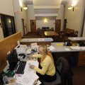 Annette Jarnagan, customer service representative at the Fayetteville water department, works Tuesda...
