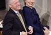 Former President Bill Clinton shares a laugh with his wife, Secretary of State Hillary Rodham Clinton, in January before an inaugural prayer service in Washington, D.C.