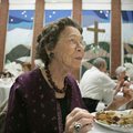 Jessie Holyfield of Rogers enjoys a traditional Thanksgiving Day meal Thursday at First United Metho...