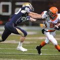 Nashville senior receiver Paul Morrow, right, reaches to fend off Shiloh Christian junior defensive ...