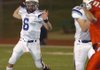 Springdale Har-Ber’s Ryan Luther looks for an open receiver during the Class 7A semifinal game against Cabot on Friday night in Cabot.