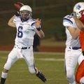 Springdale Har-Ber’s Ryan Luther looks for an open receiver during the Class 7A semifinal game again...