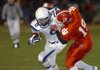 Springdale Har-Ber’s Kaleb Vaughn, left, tries to elude Cabot’s Logan Spry during the Class 7A state semifinal game Friday night in Cabot.
