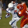 Springdale Har-Ber’s Kaleb Vaughn, left, tries to elude Cabot’s Logan Spry during the Class 7A state...