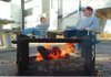 Jean and Royce Johnson of Decatur relax by a campfire Saturday at Horseshoe Bend park on Beaver Lake. The park is one of five on the lake that offers winter camping.