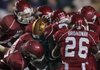 Arkansas defenders surround LSU TE Richard Dickson in the fourth quarter of the Razorbacks 33-30 overtime loss.