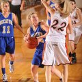 Decatur’s Tiffany Wright, center, looks to shoot as Gravette’s Kaitlynn Britton defends during the f...