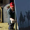 Nothing new to him First Baptist Church maintenance worker Brian Weaver sets up one of nine boards t...