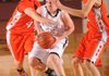 Bentonville Gold’s Garrett Kaufman, center, is pressured by Gravette’s Cody Nims, left, during Monday’s junior boys game in the Benton County Invitational at Siloam Springs.
