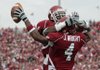 Arkansas 42, Mississippi St. 21 
Jarius Wright celebrates Saturday after scoring a secondquarter touchdown in the Razorbacks’ win at War Memorial Stadium in Little Rock. 
