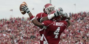 Arkansas 42, Mississippi St. 21 
Jarius Wright celebrates Saturday after scoring a secondquarter touchdown in the Razorbacks’ win at War Memorial Stadium in Little Rock. 