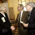 Kim Harington (left), widow of novelist Donald Harington, talks with Eddie Bradford and his wife, Be...