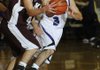 Fayetteville’s Kikko Haydar guards Jenks’ Tanner Bushyhead in the first half of their game Tuesday.