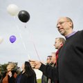 Thomas Markham, right, president of the Board of Directors for the Northwest Arkansas Positive Link ...