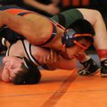 Rogers Heritage’s Peter Rameriz, top, works on pinning Van Buren’s Christian Hesslen during Tuesday’...