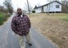 Ray Clemmons, uncle of Maurice Clemmons, stands outside his family home in Marianna. Things had seemed to be going well for his nephew. “Nice houses, nice cars, he was doing real good,” Ray Clemmons said.