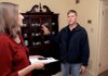 Real estate agent Aimee Long of McKay and Co. on Thursday shows Michael Taylor a condo for sale in Andover Square in Little Rock.