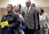 Job seekers wait in line to speak to potential employers at a job fair Tuesday in Philadelphia.