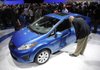 A 2011 Ford Fiesta attracts attention after its unveiling Wednesday at the Los Angeles Auto Show.