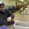 Brent Koci works Wednesday at the Adult Development Center in Siloam Springs. Siloam Springs may cut...