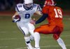 Springdale Har-Ber’s Kaleb Vaughn tries to get past Cabot’s Logan Spry during their Class 7A semifinal game Friday in Cabot.