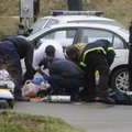 Fayetteville firefighters and paramedics from Central EMS prepare to transport Matthew L. Anderson W...
