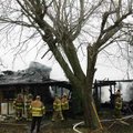 Rogers fire Rogers Fire Department firefighters work to put out a house fire at 1601 N. C St. on Wed...