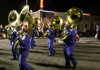 Students in the Rogers High School marching band trek down the street during the 2007 Christmas parade in Rogers. This year’s edition of the town’s parade and festivities takes place at 7 p.m. Monday.